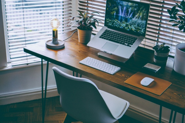 Desk set up and venetian blinds in home office