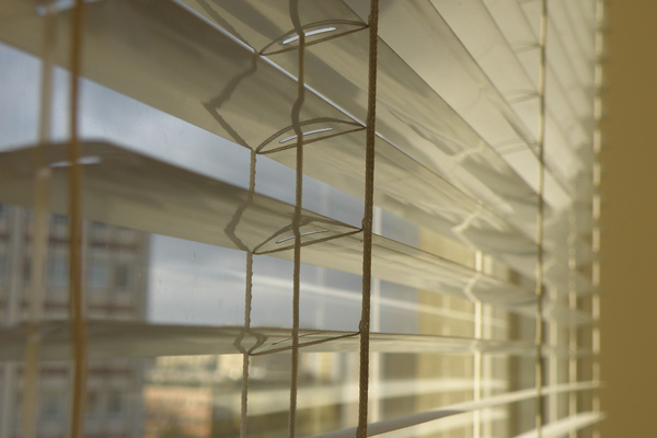 White venetian blinds in a kitchen