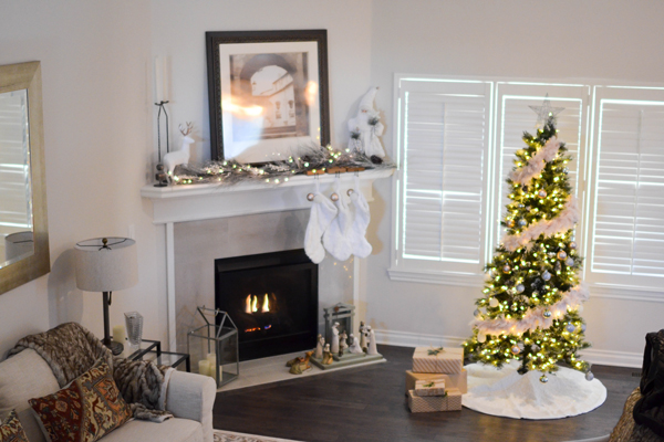 a living room interior decor idea on how to decorate windows for Christmas